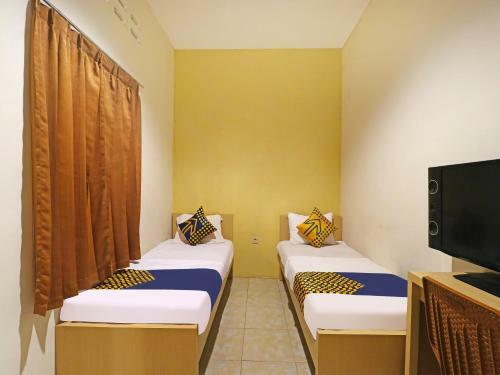 Hotel Spot On 91504 de Vila Ungu Syariah