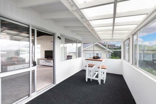 Couches, Bar Table & Kawau View
