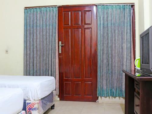 Capital O 91517 Hotel Gajah Mada Soe