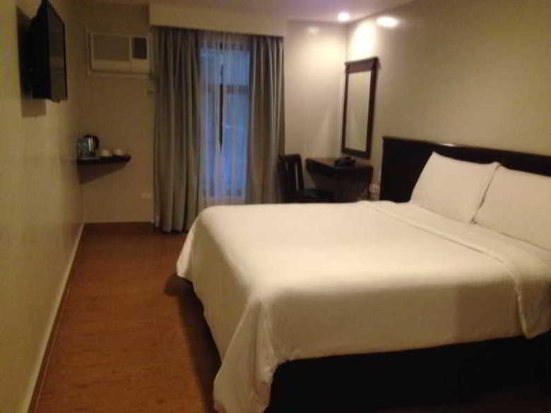 Mj Hotel And Suites