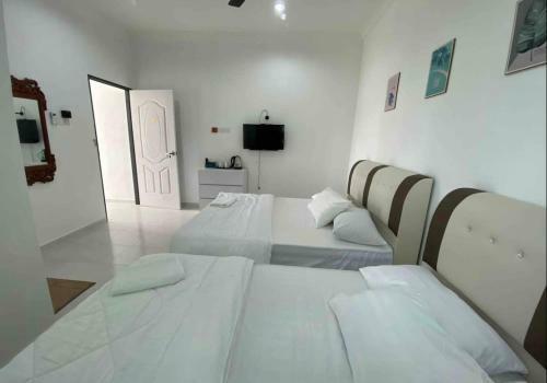 Hostal Dsinggahpcb Guest House