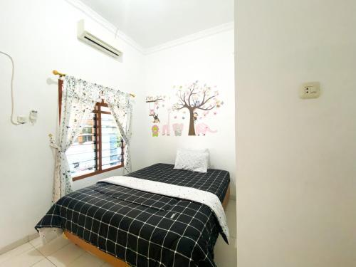 Hostal Homey Guesthouse Kertajaya (Syariah)
