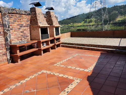 Caba�a En Paipa Con Vista Al Lago