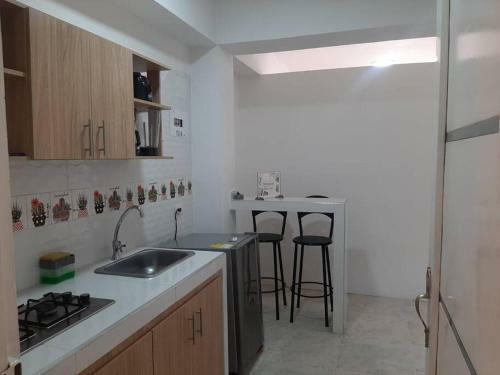 Apartaestudios White And Grey