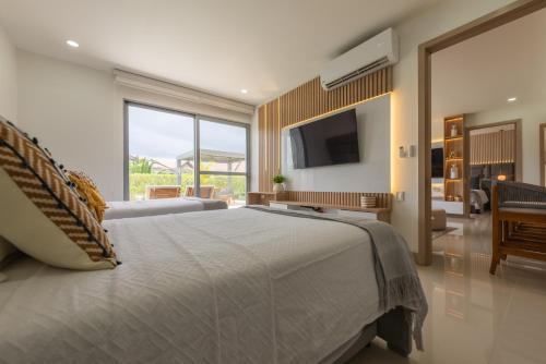 Lujoso Apartamento Con Salida Directa A La Playa Edificio Morros Eco