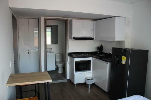 Apartamento Unilago Suites