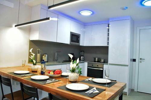 Apartamento Modern Oasis - Pool, Gym & Tennis