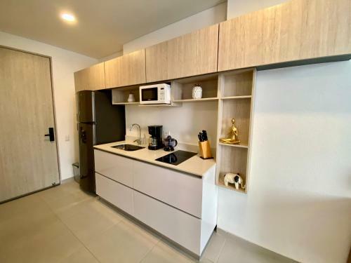 Apartamento Charming Suite / Pozos Colorados