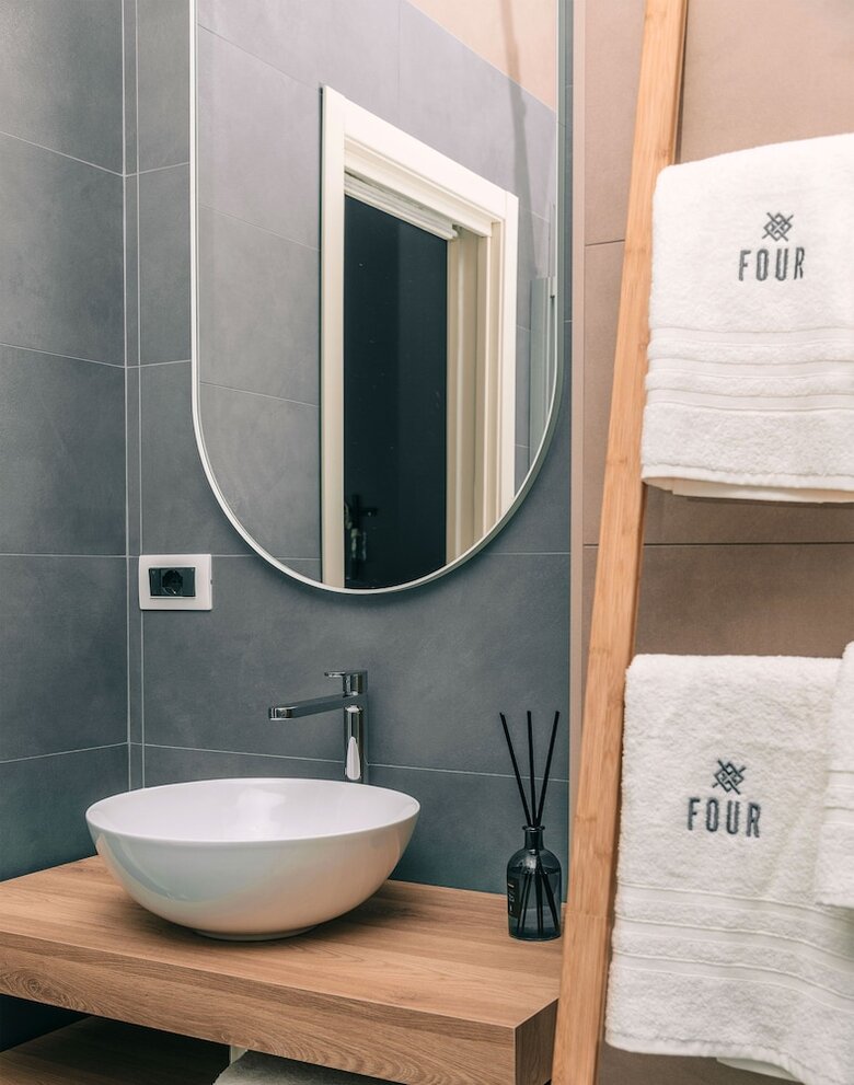 Four - Acanfora Suites