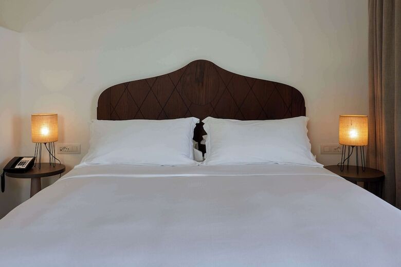 Sea Breeze Santorini Beach Resort, Curio Collection Hilton