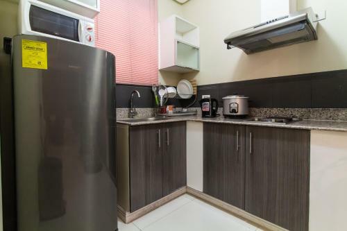 Jmm Apartment Suites