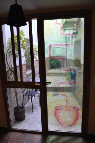 Apartamentos La Casa Pintada