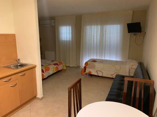 Aparthotel Raquel's