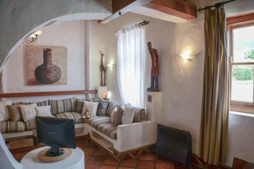 Hostal Old Thatch Lodge