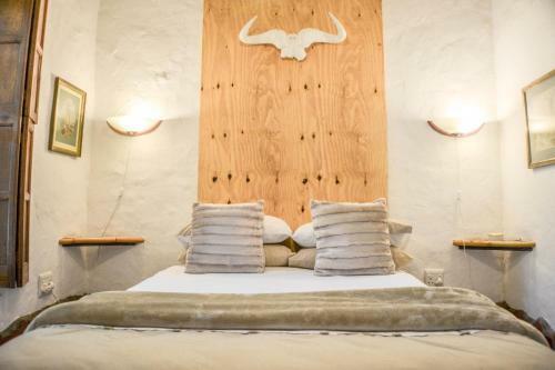 Hostal Old Thatch Lodge