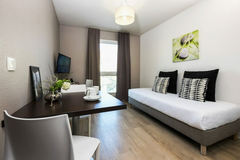 Residencia Teneo Suites
