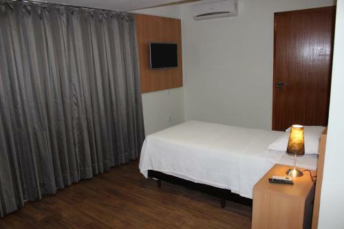 Vertentes Su�tes Hotel
