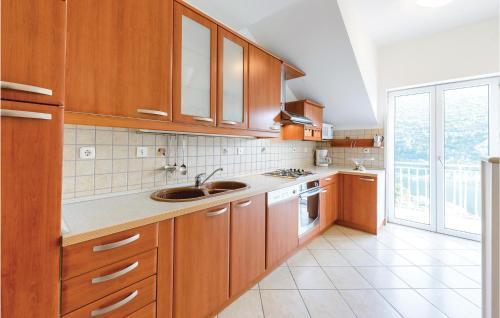 Three-bedroom Apartment Mokosica With Sea View 08