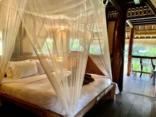 Flower Bud Bungalow Balangan