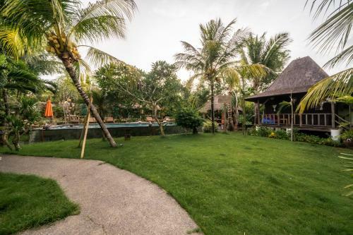 Flower Bud Bungalow Balangan