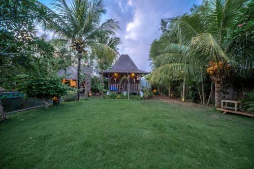 Flower Bud Bungalow Balangan