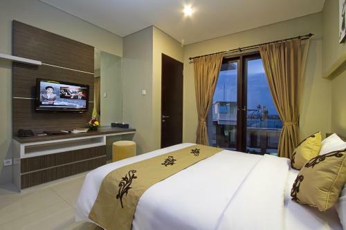 Hotel Denbukit Residence And Suite