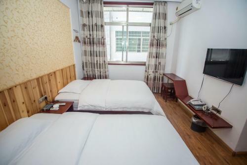 Posada Zhangjiajie Yijiaqin Hotel