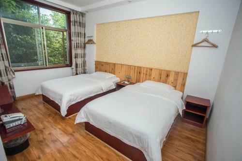 Posada Zhangjiajie Yijiaqin Hotel