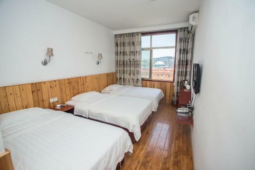 Posada Zhangjiajie Yijiaqin Hotel