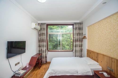 Posada Zhangjiajie Yijiaqin Hotel