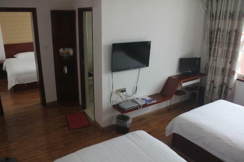 Posada Zhangjiajie Yijiaqin Hotel