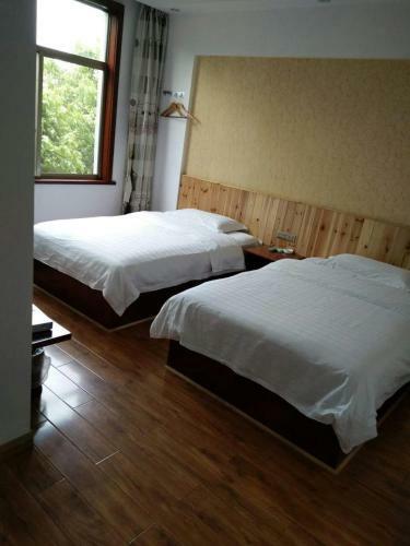 Posada Zhangjiajie Yijiaqin Hotel