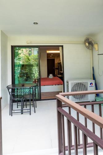 Apartamentos The Title Beach Front