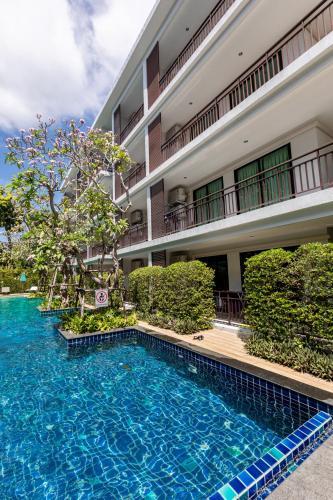 Apartamentos The Title Beach Front