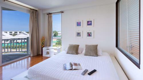 Apartamentos Baan Poolom Beachfront Condominium