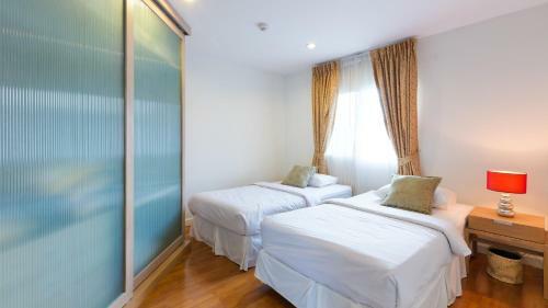 Apartamentos Baan Poolom Beachfront Condominium