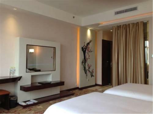 Vienna Hotel Songjiang Xin Qiao