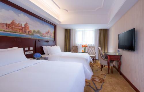 Vienna Hotel Songjiang Xin Qiao