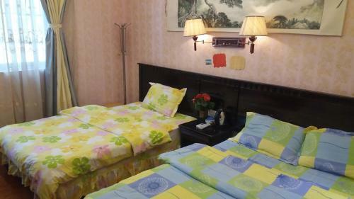 Hostal Yangshuo Baijiale Theme Inn