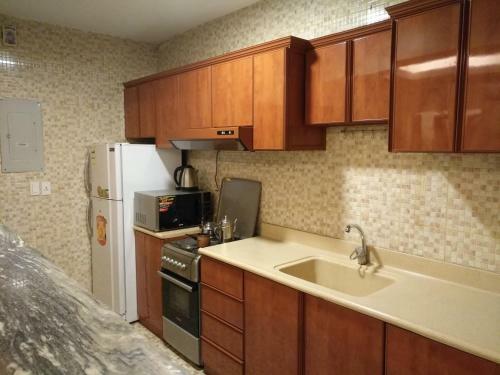 Apartamento Crown Glory Hotel Suites