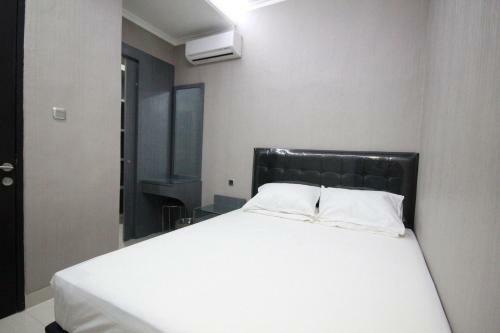 Apartamentos Harvia Suites Kebon Jeruk