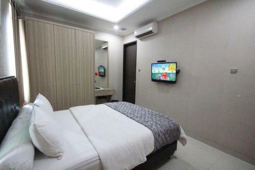 Apartamentos Harvia Suites Kebon Jeruk