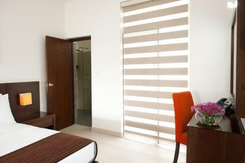 The Beach - All Suite Hotel