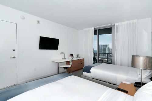 Apartamento Beachwalk Resort By Sunnyside Retreats