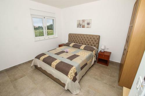 Apartment In Funtana With Three-bedrooms 1