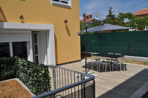 Apartment In Funtana With Three-bedrooms 1