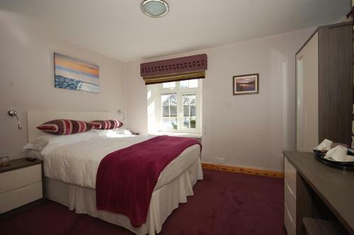 Hostal Riverside Cottage Guesthouse