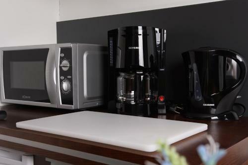 Apartamento Triumph Inn