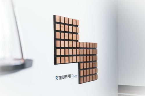 Apartamento Triumph Inn