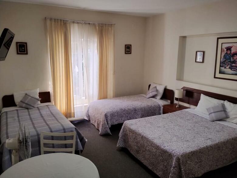Posada The Place Hostal